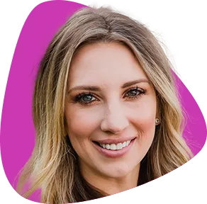 Nikki Hudson, smiling, with long blonde hair.