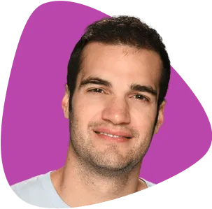 Paul Grossinger, smiling, with short dark hair.