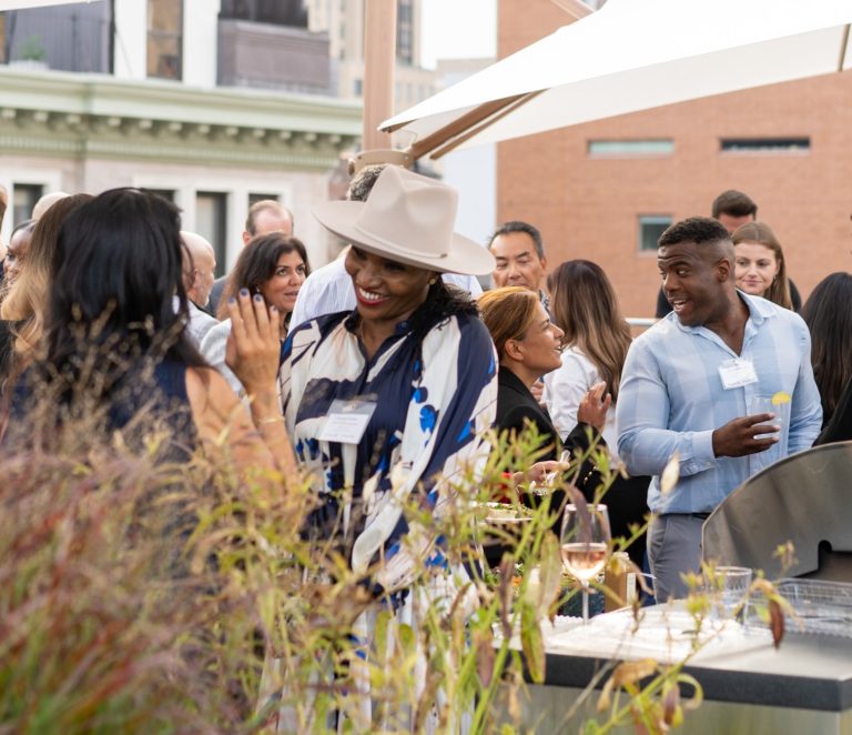 people gathered on a different Gaingels events on a rooftop